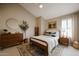 Serene bedroom featuring a wooden bed, shuttered window, and stylish décor for a tranquil retreat at 6533 N 7Th Ave # 18, Phoenix, AZ 85013