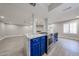 Bright, open-plan kitchen with island and stainless steel appliances at 6533 N 7Th Ave # 18, Phoenix, AZ 85013