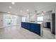 Spacious room with kitchen island and access to the backyard at 6533 N 7Th Ave # 18, Phoenix, AZ 85013