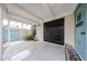 Covered outdoor patio area with secure gate and access to the laundry room at 6533 N 7Th Ave # 18, Phoenix, AZ 85013