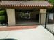 Poolside cabana with tile roof and wrought iron gate overlooking the pool and surrounding area at 6533 N 7Th Ave # 18, Phoenix, AZ 85013
