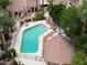 Community pool featuring lounge chairs and shady seating areas at 6533 N 7Th Ave # 18, Phoenix, AZ 85013