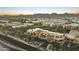 Scenic aerial view of a vibrant shopping area and mountains, with colorful buildings and lush landscaping at 7180 E Kierland Blvd # 814, Scottsdale, AZ 85254