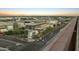 Aerial view of city buildings at dusk with the setting sun creating a picturesque skyline at 7180 E Kierland Blvd # 814, Scottsdale, AZ 85254