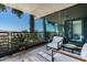 Relaxing balcony with mountain views, lounge chairs, and lush greenery at 7180 E Kierland Blvd # 814, Scottsdale, AZ 85254