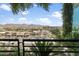 Scenic balcony view overlooking the city, mountains, and local shops at 7180 E Kierland Blvd # 814, Scottsdale, AZ 85254