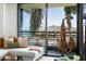 Scenic view from balcony with large window, showcasing comfortable living space and mountain views at 7180 E Kierland Blvd # 814, Scottsdale, AZ 85254