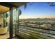 Enjoy the mountain view from this condo's balcony in this cityscape at 7180 E Kierland Blvd # 814, Scottsdale, AZ 85254