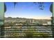Enjoy the mountain view from this condo's balcony in this cityscape at 7180 E Kierland Blvd # 814, Scottsdale, AZ 85254