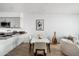 Bright dining area with light wood floors, modern furniture, and an open floor plan at 7180 E Kierland Blvd # 814, Scottsdale, AZ 85254