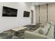 Comfortable game room with couches, televisions and gaming tables at 7180 E Kierland Blvd # 814, Scottsdale, AZ 85254