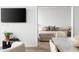 Cozy living room that offers a view into the bedroom featuring modern furnishings at 7180 E Kierland Blvd # 814, Scottsdale, AZ 85254