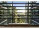 Modern lounge area with expansive views of lush landscaping through floor-to-ceiling windows at 7180 E Kierland Blvd # 814, Scottsdale, AZ 85254