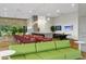 Spacious lounge area featuring a kitchen area, lounge seating, games, and tv screens at 7180 E Kierland Blvd # 814, Scottsdale, AZ 85254