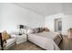 Comfortable bedroom with hardwood floors, light colored walls, and elegant decor at 7180 E Kierland Blvd # 814, Scottsdale, AZ 85254