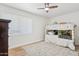 Bright bedroom with bunk beds, hardwood floors, window with blinds, and neutral decor at 7607 N 17Th Ave, Phoenix, AZ 85021