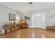 Welcoming entryway with wood flooring, a decorative table, and natural lighting at 7607 N 17Th Ave, Phoenix, AZ 85021