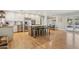 Bright, open kitchen featuring an island with seating, stainless steel appliances, and white cabinetry at 7607 N 17Th Ave, Phoenix, AZ 85021