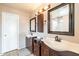 Bright bathroom with dual sinks, vanity, and ample counter space at 822 E Ross Ave, Phoenix, AZ 85024