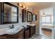 Bathroom featuring double sinks, vanity, and natural lighting at 822 E Ross Ave, Phoenix, AZ 85024