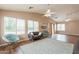 Spacious living room featuring wood floors, ceiling fans, and natural light at 822 E Ross Ave, Phoenix, AZ 85024