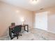 Comfortable home office space with a desk and a closet at 822 E Ross Ave, Phoenix, AZ 85024