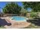 Backyard featuring a sparkling pool and landscaped surroundings at 822 E Ross Ave, Phoenix, AZ 85024