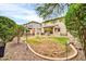 Expansive backyard with lush greenery and patio, perfect for outdoor entertaining and relaxation at 9034 W Eagle Talon Dr, Peoria, AZ 85383