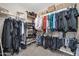 Walk-in closet with ample storage space for clothing, shoes, and accessories at 9034 W Eagle Talon Dr, Peoria, AZ 85383