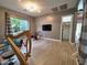 Spacious bonus room featuring a full drum set, modern lighting, and neutral wall colors at 9187 W Parkside Ln, Peoria, AZ 85383