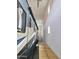 Garage interior featuring recreational vehicle parked closely to side wall for maximum space at 9187 W Parkside Ln, Peoria, AZ 85383