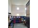 A well-organized garage with shelving units and storage containers, maximizing space for efficient storage at 9187 W Parkside Ln, Peoria, AZ 85383
