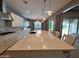Spacious kitchen island perfect for meal prep and casual dining with generous countertops at 9187 W Parkside Ln, Peoria, AZ 85383