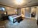 Serene main bedroom with plush carpeting, neutral tones, and elegant furnishings at 9187 W Parkside Ln, Peoria, AZ 85383