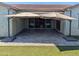 Lovely covered patio with tile flooring and modern cantilevered umbrellas for shade at 9187 W Parkside Ln, Peoria, AZ 85383