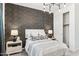Tastefully decorated bedroom showcasing elegant lighting and a functional closet at 9815 S 11Th St, Phoenix, AZ 85042