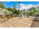 Inviting common area with ample seating, lush trees and landscaping, and relaxing atmosphere at 1 E Lexington Ave # 1108, Phoenix, AZ 85012