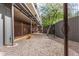 Outdoor dog run area with gravel ground and convenient access to amenities at 1 E Lexington Ave # 1108, Phoenix, AZ 85012