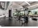 Spacious fitness center with modern exercise equipment and ample natural light from large windows at 1 E Lexington Ave # 1108, Phoenix, AZ 85012