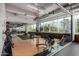Well-equipped gym featuring state-of-the-art machines and large windows providing city views at 1 E Lexington Ave # 1108, Phoenix, AZ 85012