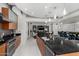 Contemporary kitchen boasts stainless steel appliances, granite countertops, and bright, open design at 1 E Lexington Ave # 1108, Phoenix, AZ 85012