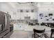 Beautiful kitchen featuring stainless steel appliances, modern countertops and backsplash at 1 E Lexington Ave # 1108, Phoenix, AZ 85012