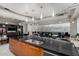 Spacious kitchen with sleek countertops and stainless steel appliances adjoins an elegant seating area at 1 E Lexington Ave # 1108, Phoenix, AZ 85012