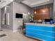 Welcoming lobby with sleek design features an impressive reception desk and ambient lighting at 1 E Lexington Ave # 1108, Phoenix, AZ 85012