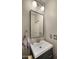 Stylish powder room features modern fixtures and elegant design elements at 10224 E Talameer Ave, Mesa, AZ 85212