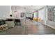 Bright and spacious living area features a kitchen, breakfast nook, and open-concept floor plan at 1057 W Laurel Ave, Gilbert, AZ 85233