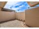 Spacious backyard featuring a rock landscape and perimeter brick wall at 11149 W Palm Ridge Dr, Sun City, AZ 85351