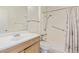 Clean bathroom with vanity, toilet, and shower-tub combination at 11149 W Palm Ridge Dr, Sun City, AZ 85351