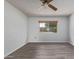 Bright bedroom with new flooring and window view at 11149 W Palm Ridge Dr, Sun City, AZ 85351