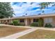 Charming exterior view of single story homes with well-maintained lawns at 11149 W Palm Ridge Dr, Sun City, AZ 85351